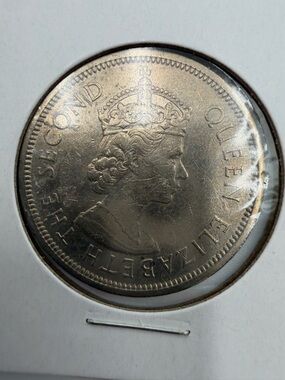 1960 Hong Kong One Dollar coin featuring Queen Elizabeth II